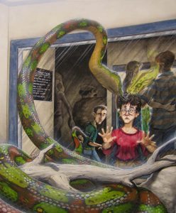 Harry talking to the snake at the zoo.